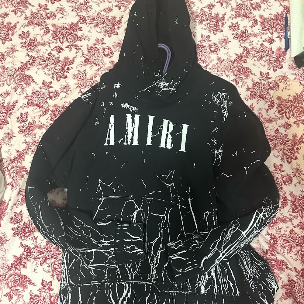 Amiri Sweater with lightning bolt design, small hole on the pocket